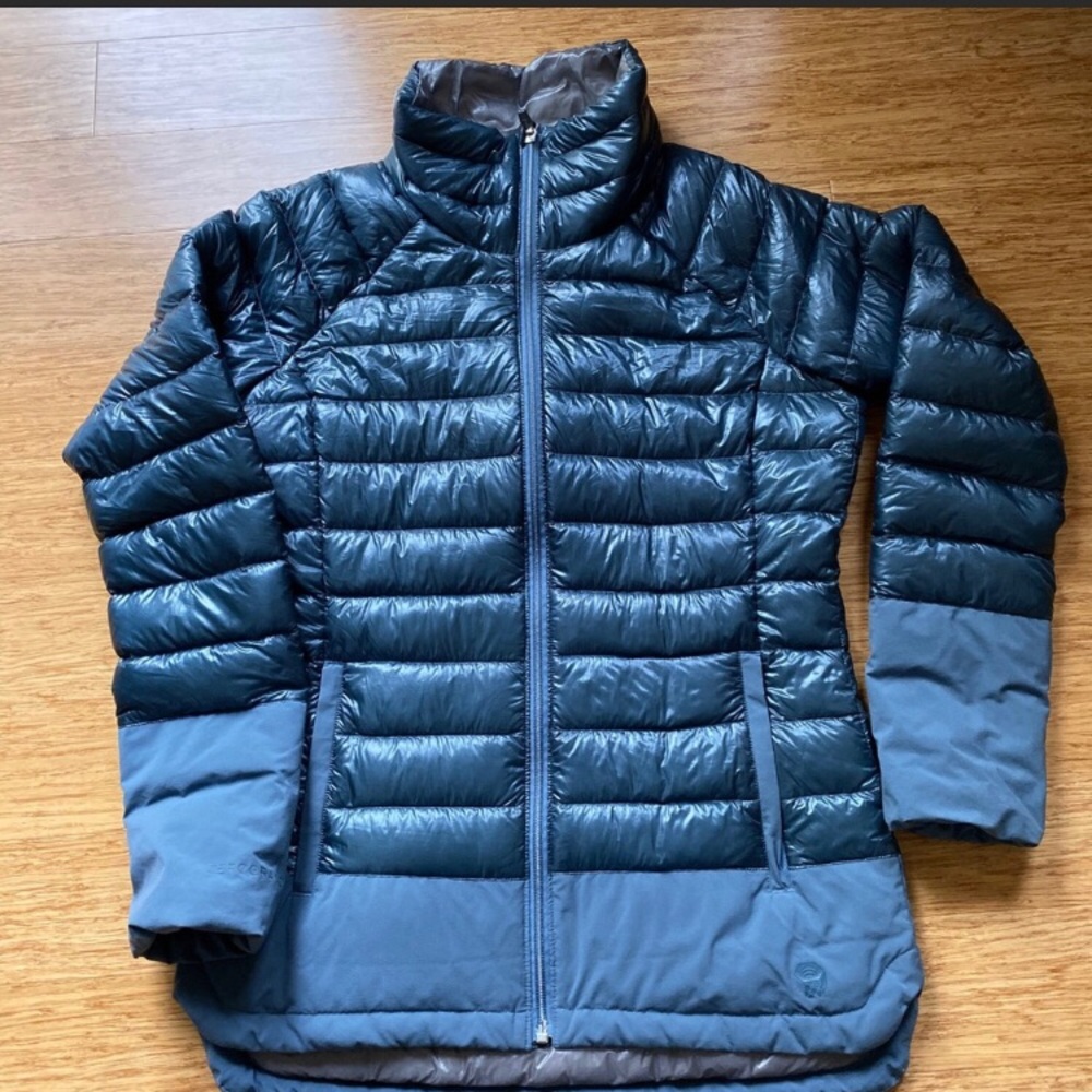 Very warm jacket. Light weight DOWN FEATHER filling.